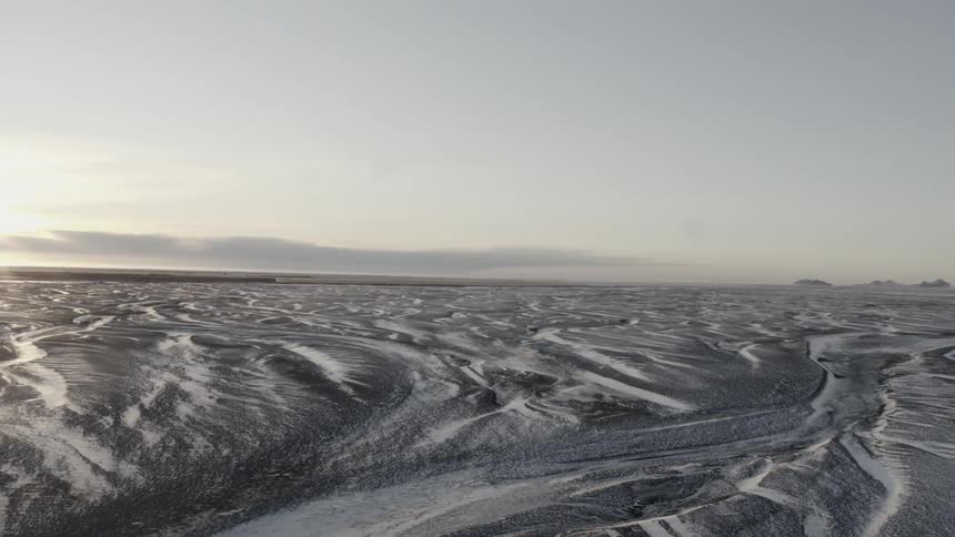 Glacier ice sheet stretches to horizon in early morning