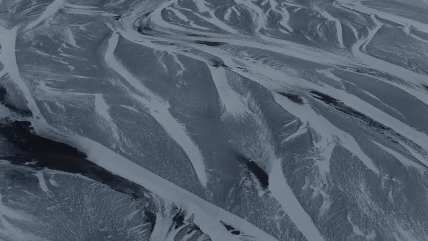 Birds eye view of snow covered land
