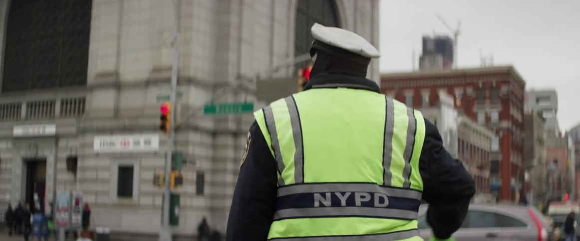 Nypd officer directs traffic