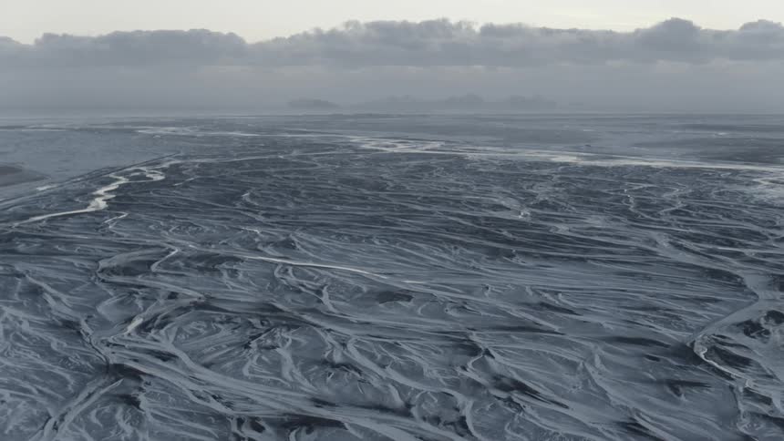 Ocean water is frozen in ripples