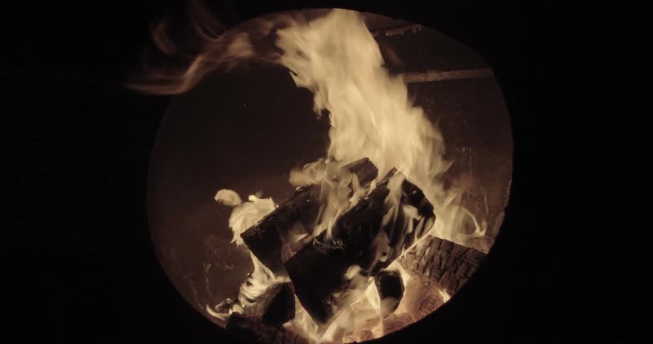Fire is pouring over logs