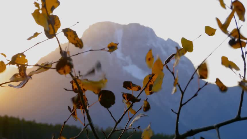 Cloudy mountain scape on a windy day at sunset