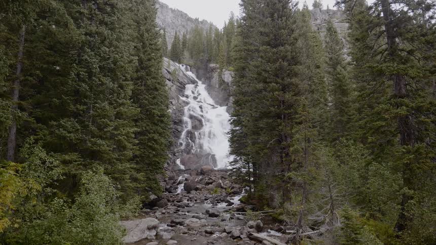 The stream runs uphill over the rocks