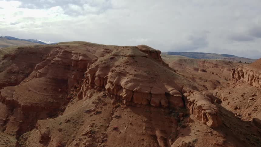Aerial view of desert mesa and canyons at daylight