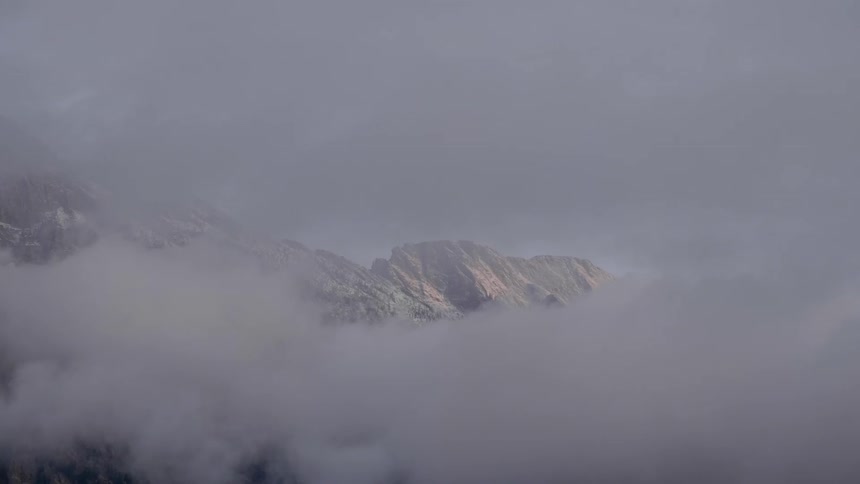 Fog on top of a mountain range