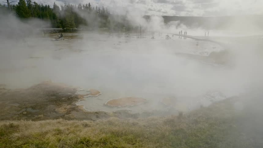 Steam rises off of a body of water