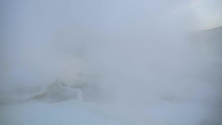 Fog and steam rise above the ground