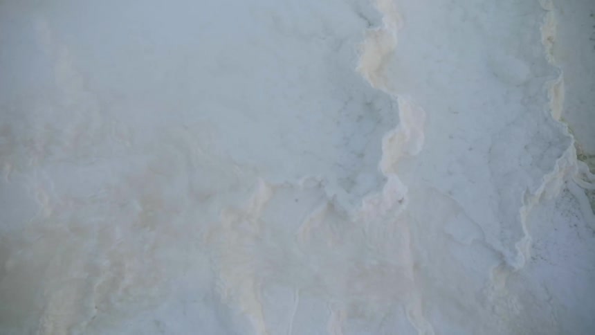 Layers of snow and ice on the ground