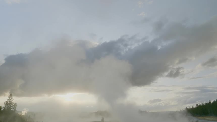 Steam coming out of natural hot spring at sunset