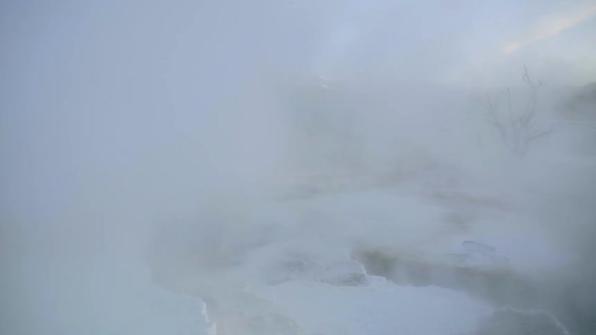 Heavy fog covers volatile hot springs