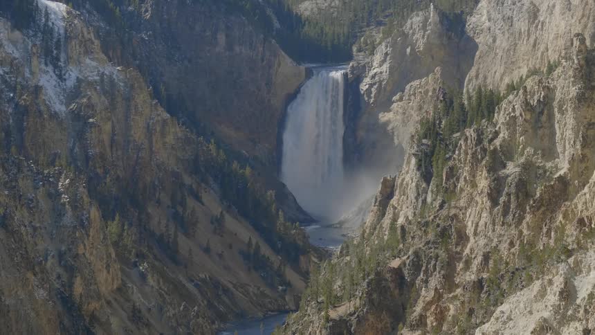 A waterfall crashed down a mountain side