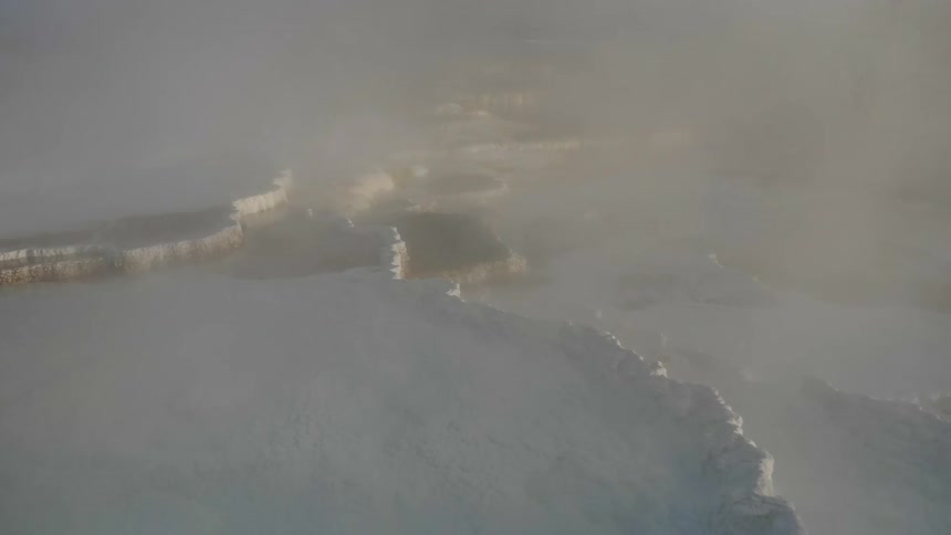 An aerial shot of a snowy area