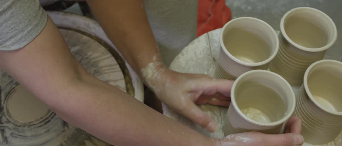 A person making pottery