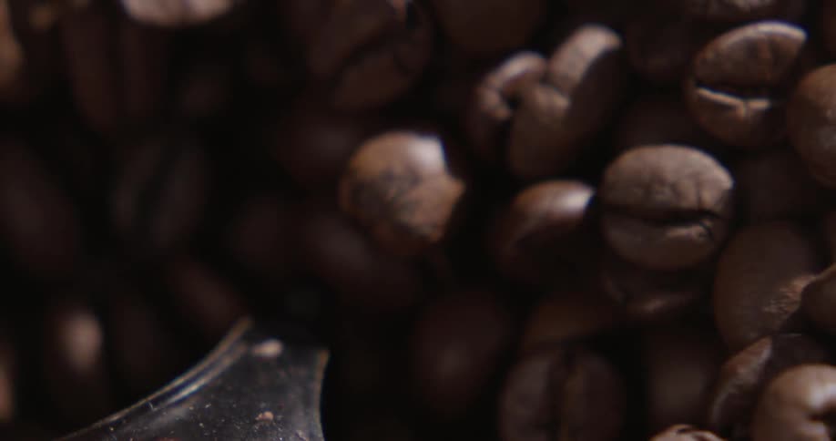 Coffee beans through a hole