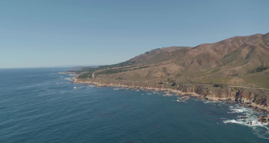 Aerial of coastal view of shoreline near cliffside