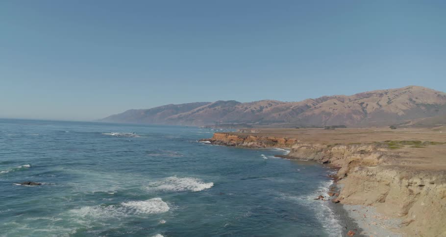 Aerial view of coastal headland with cliffs