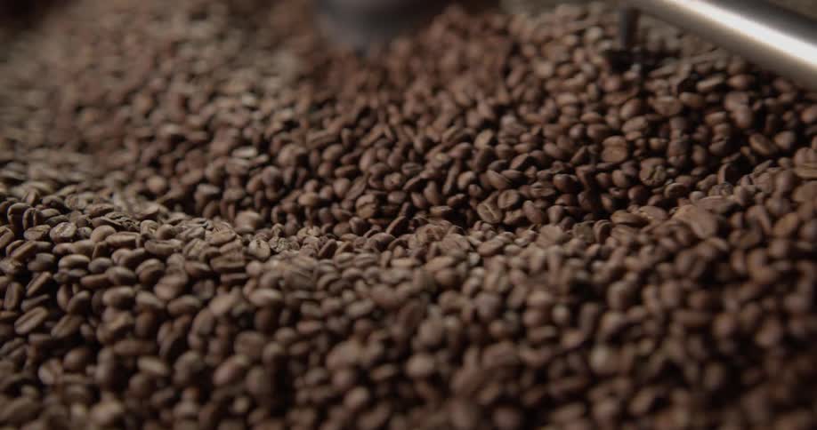 The machine is mixing the coffee beans