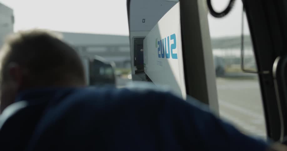 A person is driving a vehicle