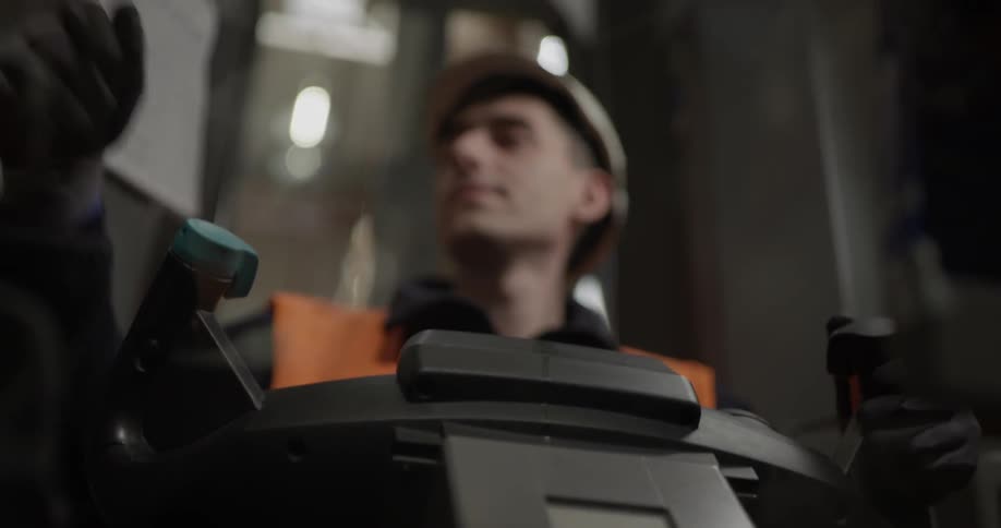 A man works in his machine