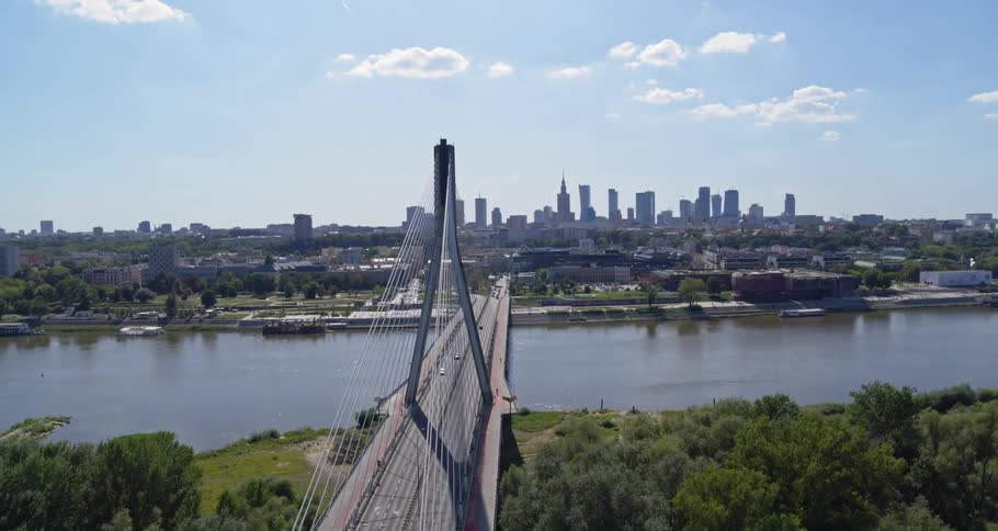 Cars are driving over a bridge