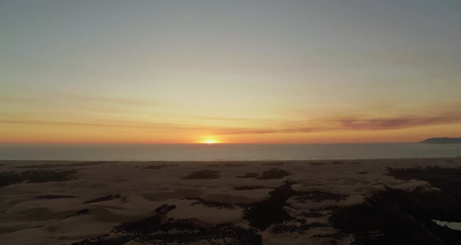 The sun rises up from the horizon