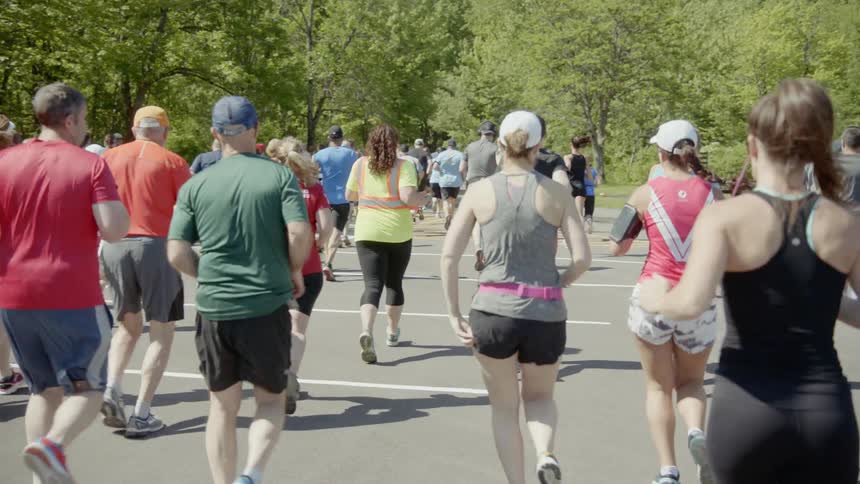 People run a marathon during daylight