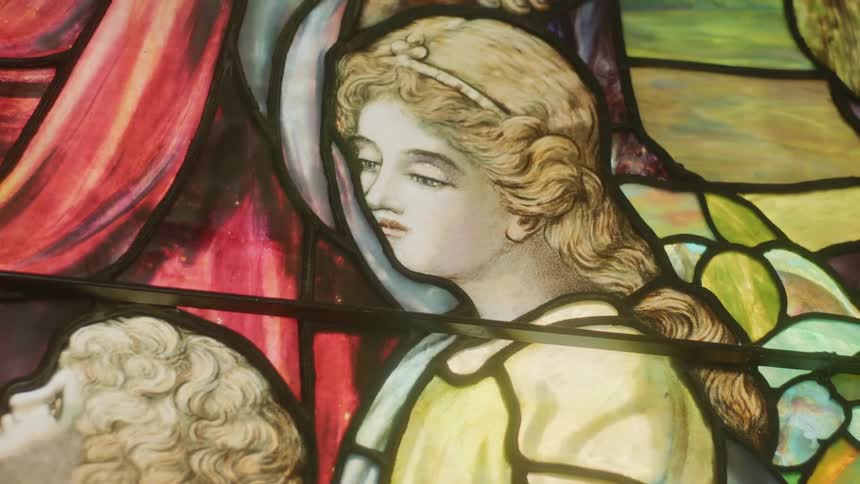 Children and jesus on a stained glass window