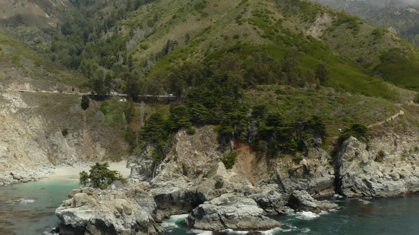 An aerial view of a rocky ocean coastline