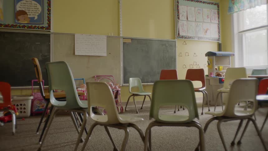 Plastic round chairs in kindergarten during daylight