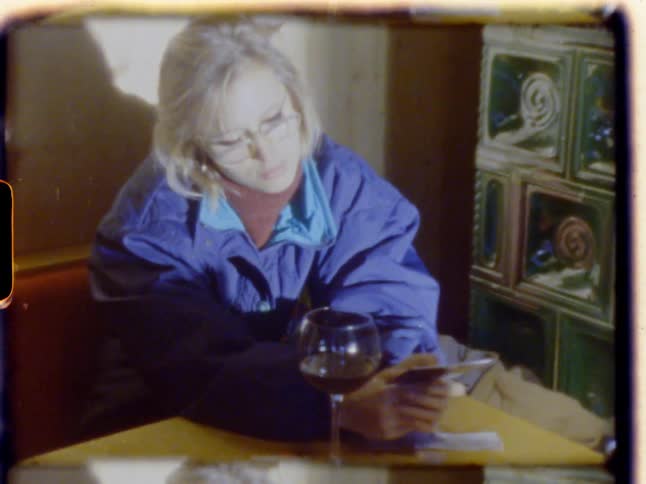 Women acting frustrated sitting at a table