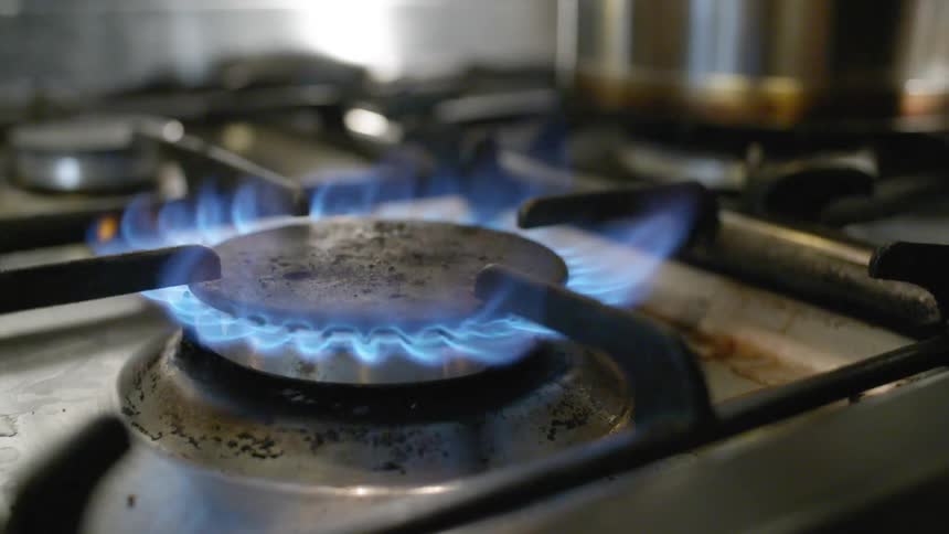 Flames burning on a gas stove