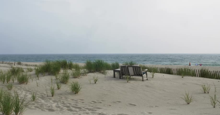A bench looks off into the ocean