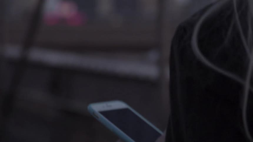 A person using their cell phone