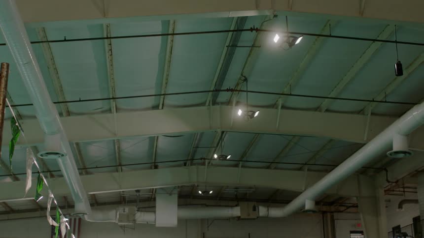 Light fixtures and pipes on a ceiling