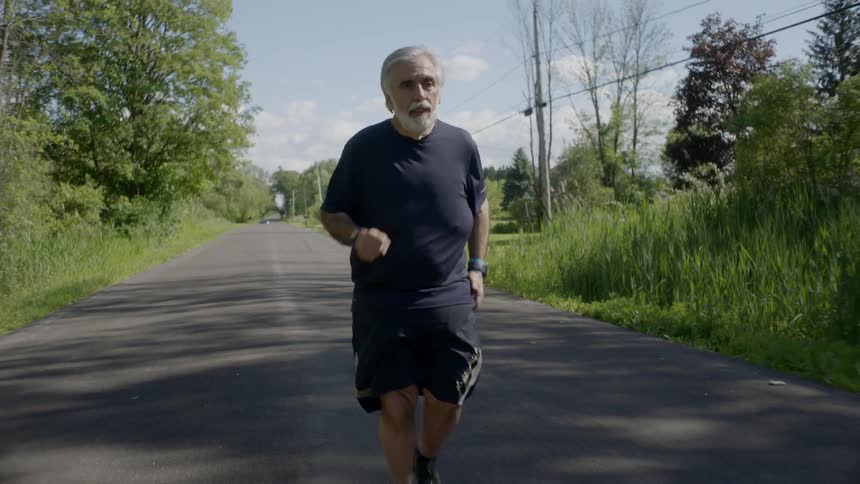 A person is jogging outdoors