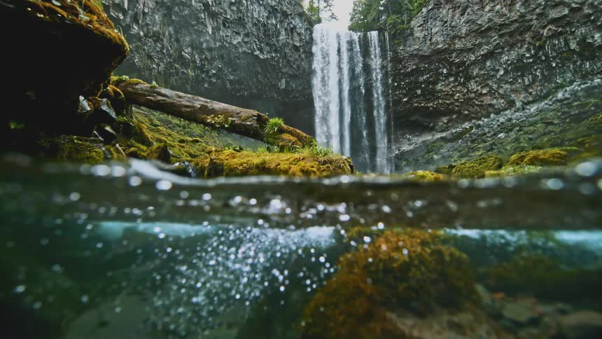 An underwater view of a waterfall