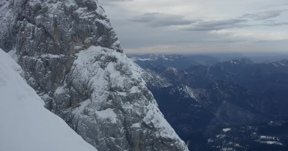 An aerial view of a snowy mountain