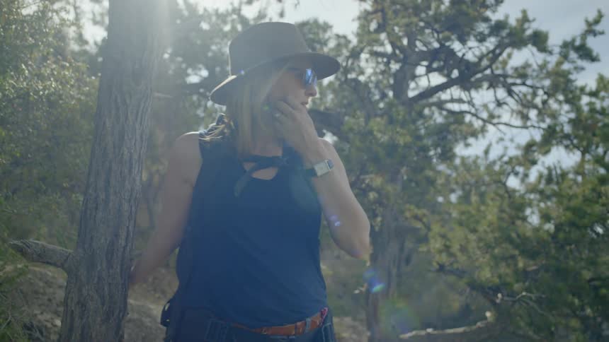 An adventurer woman at the forest