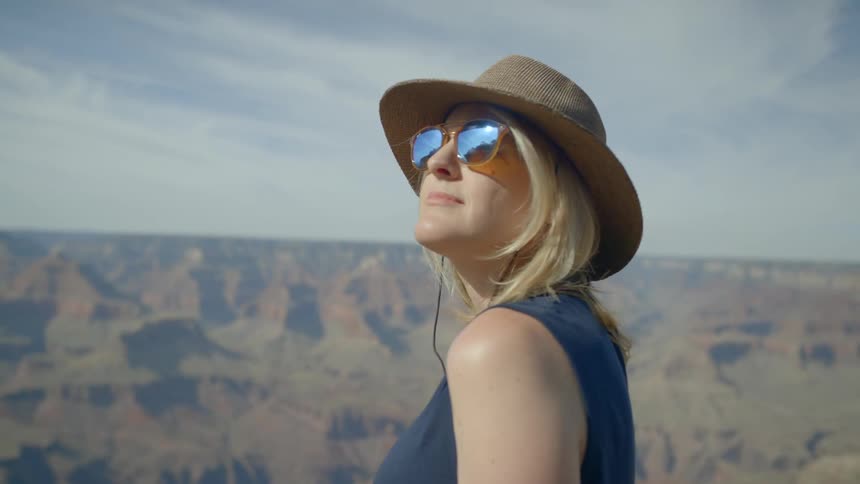 A portrait of a woman with a sun hat