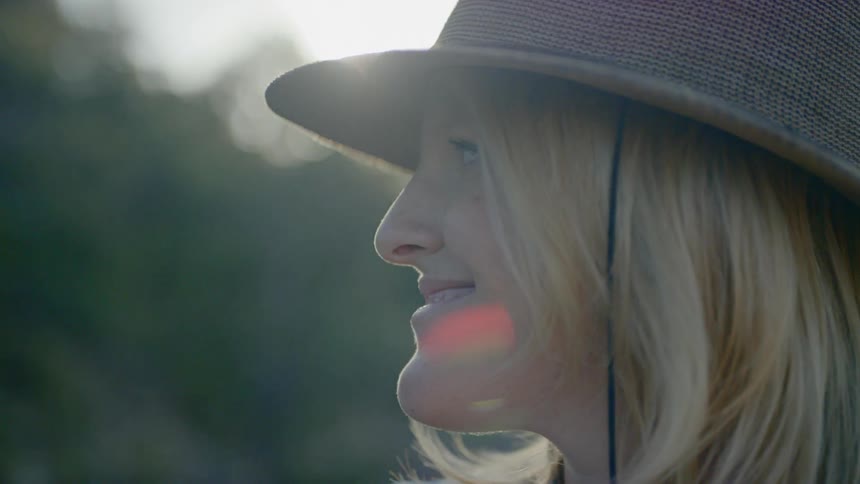 A woman with a sun hat