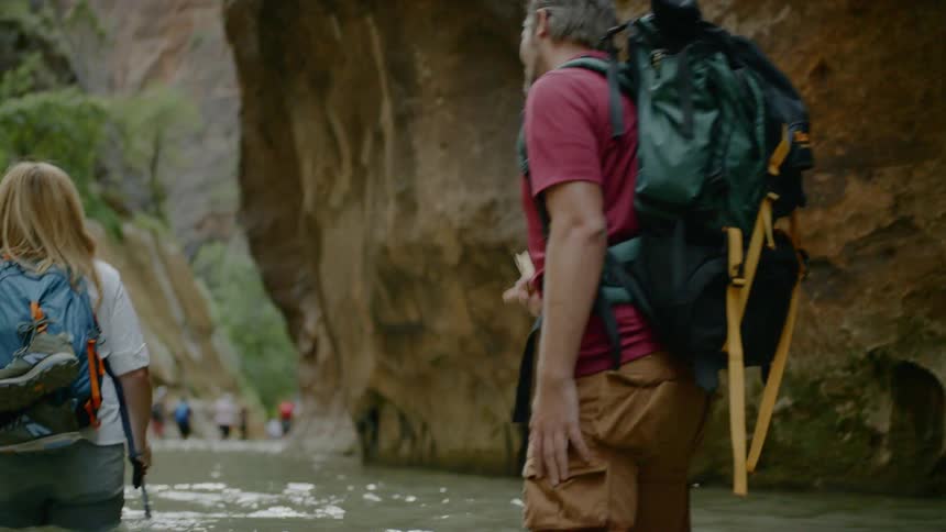Group of hikers in the river