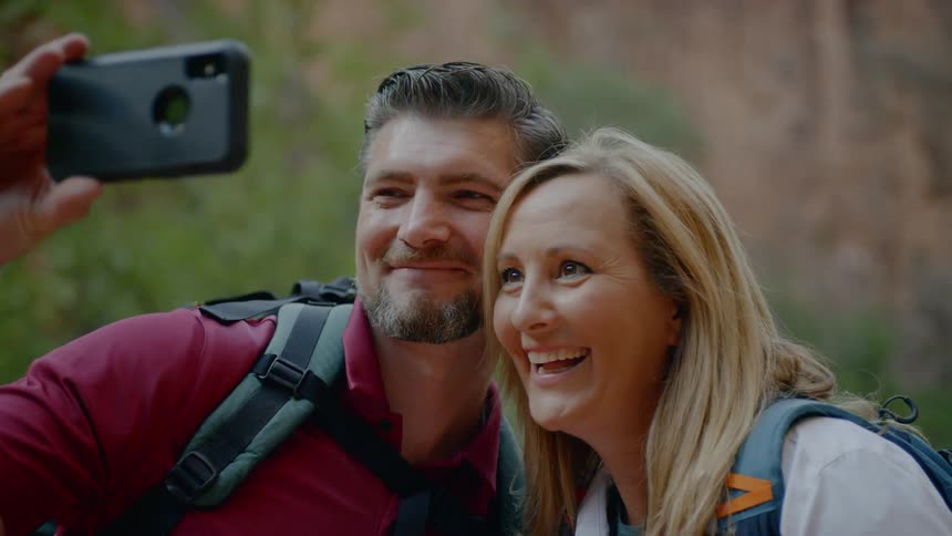 Man and woman take a selfie in the canyons