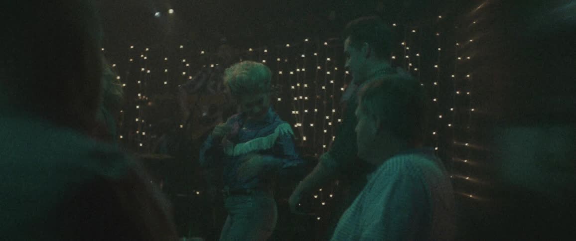 People dancing in a country western bar