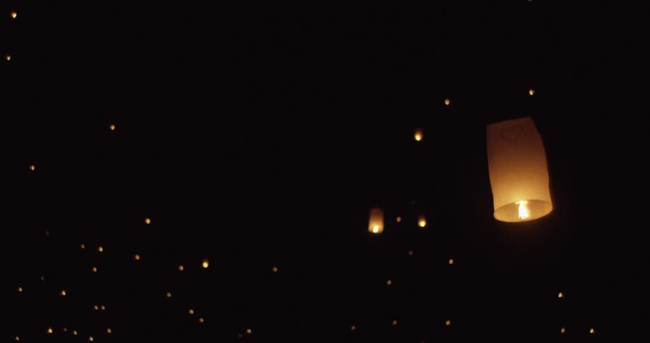 Chinese candles floating in the night sky