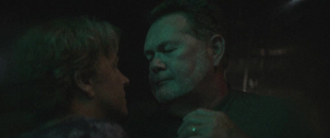 A man and woman are dancing in the bar