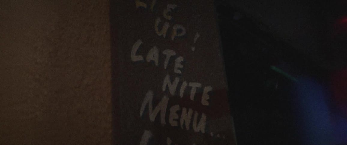 Close up of a sign at a bar