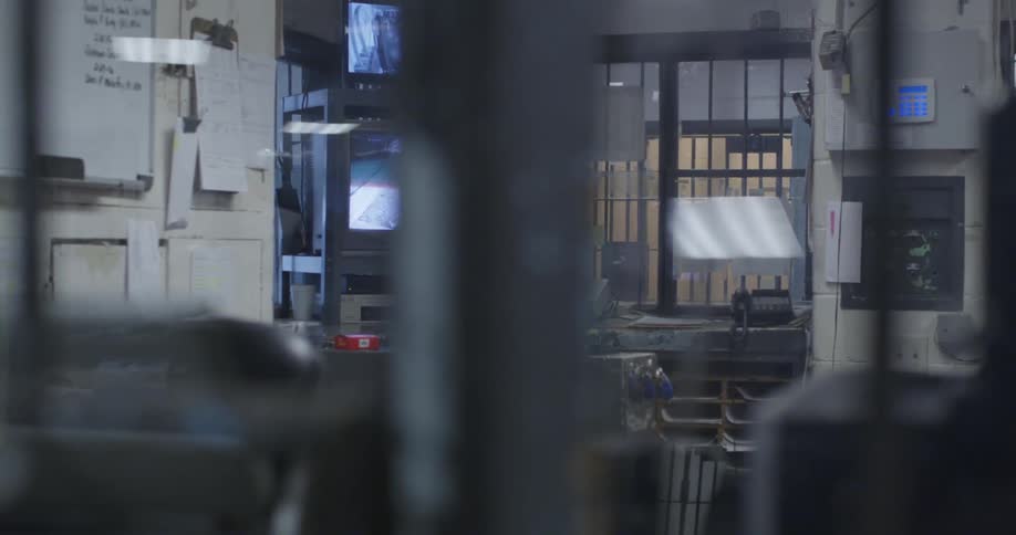 A tv monitor flashes an image