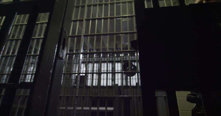 View of some bars in a dark prison