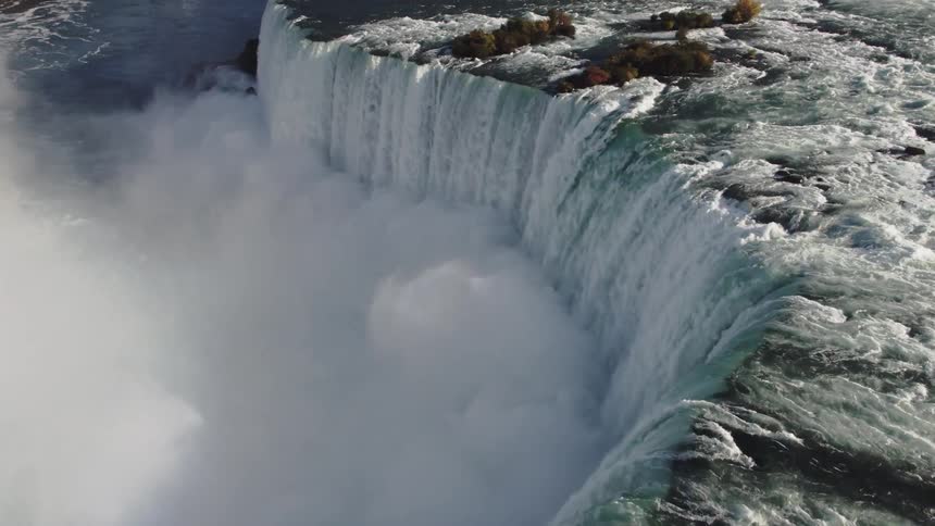 A waterfall crashes down