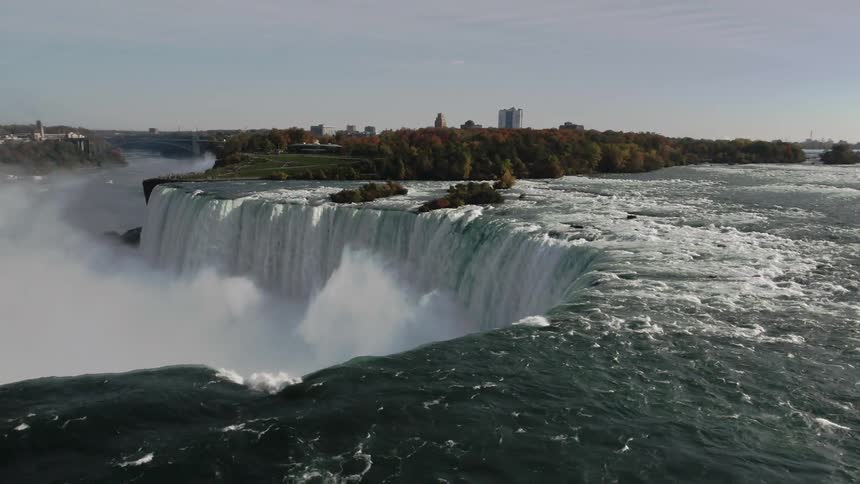 An aerial view of a great blue waterfall